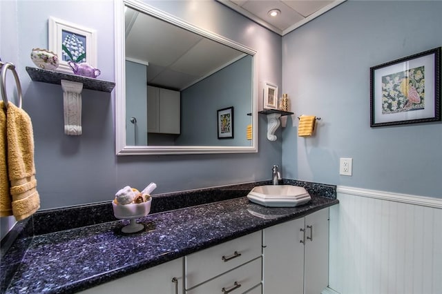 4600 Ocean Dr Unit 505, Corpus Christi, TX 78412 - bathroom featuring vanity and a wainscoted wall