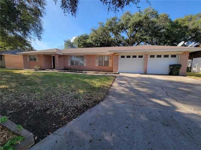 ranch-style house with a garage, driveway, brick siding, and a front lawn