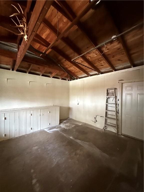 1005 Schallert Dr, Alice, TX 78332 - garage featuring wooden ceiling
