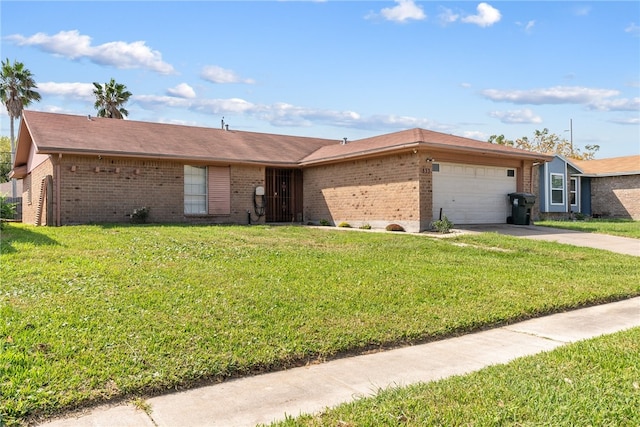 ranch-style house featuring a garage and a front yard