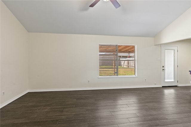 unfurnished room with dark wood-type flooring, lofted ceiling, and ceiling fan