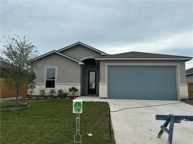 ranch-style house featuring stucco siding, concrete driveway, a garage, stone siding, and a front lawn