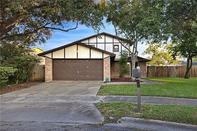 view of front facade with a front lawn and a garage