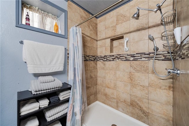 bathroom with a stall shower