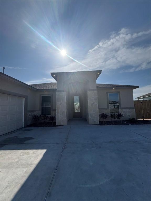 106 Guadalupe Palm Cir, Portland, TX 78374 - view of front of house with stucco siding and stone siding