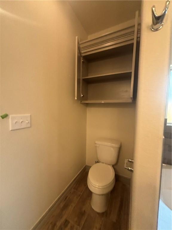 106 Guadalupe Palm Cir, Portland, TX 78374 - bathroom with toilet and wood finished floors