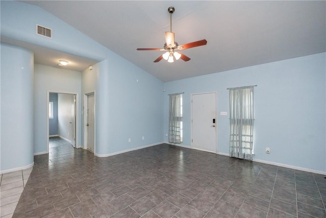 unfurnished room with ceiling fan and vaulted ceiling