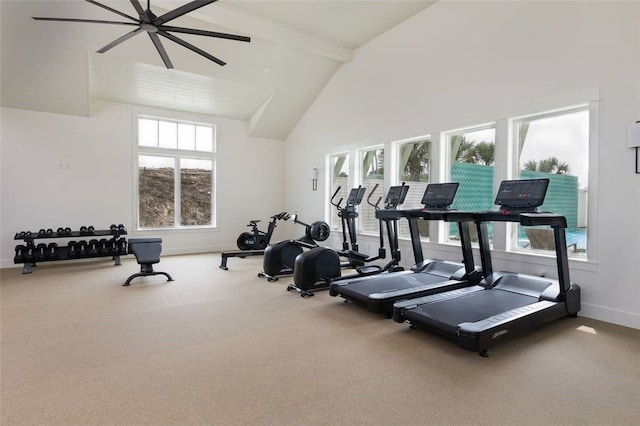 workout area featuring ceiling fan, carpet flooring, and high vaulted ceiling