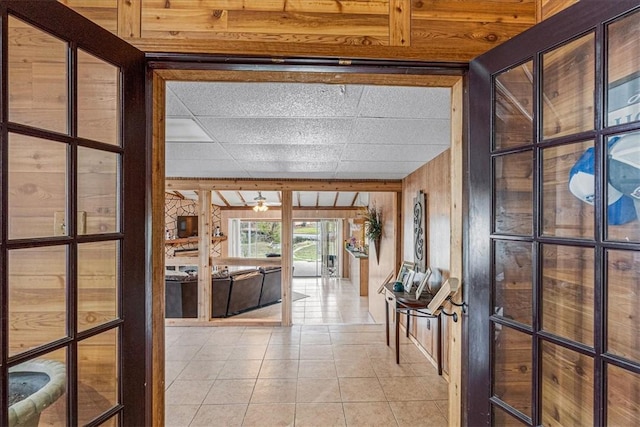 interior space with ceiling fan