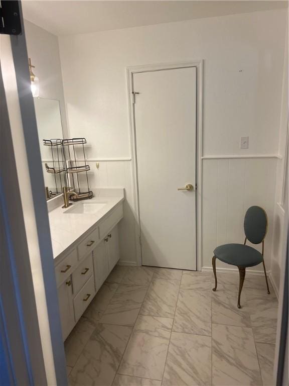 3023 66th St, Lubbock, TX 79413 - bathroom with marble look tiles and vanity