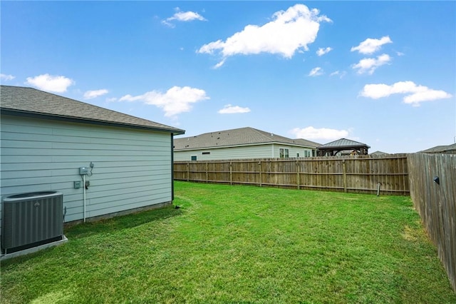 view of yard featuring central AC unit