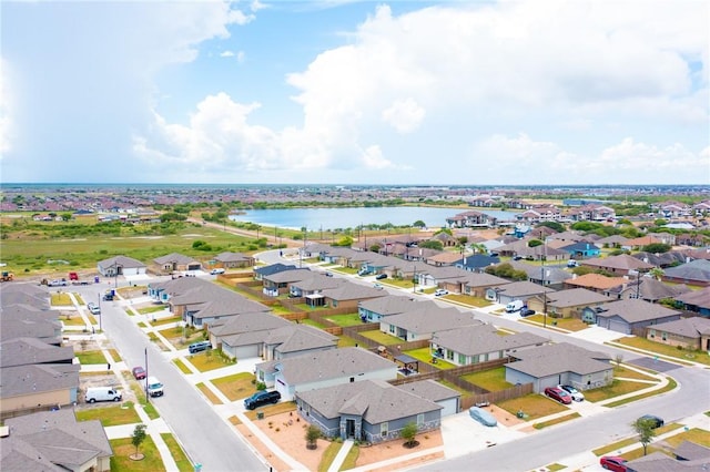 bird's eye view with a water view