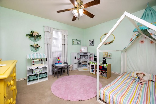 carpeted bedroom with ceiling fan