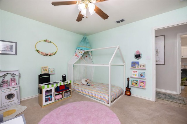 carpeted bedroom featuring ceiling fan