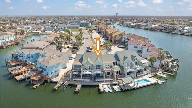 aerial view featuring a residential view and a water view