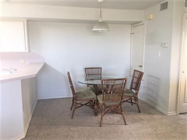 dining room with carpet