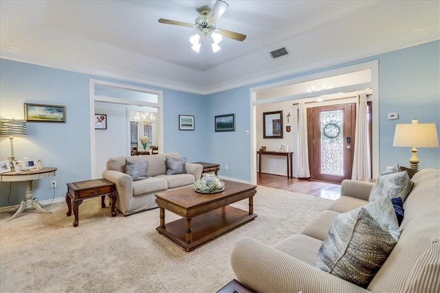 7430 Bourget Dr, Corpus Christi, TX 78413 - living room with a chandelier, a ceiling fan, and carpet floors