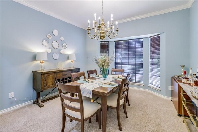 7430 Bourget Dr, Corpus Christi, TX 78413 - dining space with light carpet, a chandelier, and crown molding