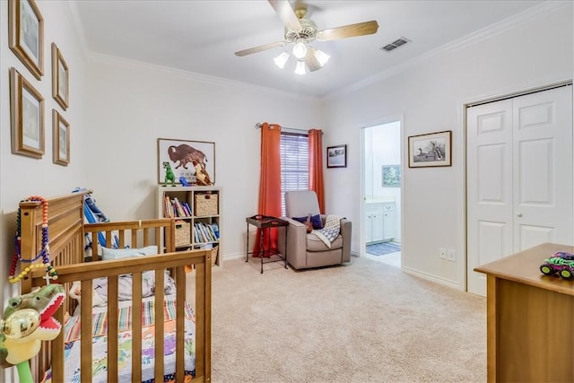 7430 Bourget Dr, Corpus Christi, TX 78413 - bedroom featuring light carpet, a closet, crown molding, ceiling fan, and ensuite bath