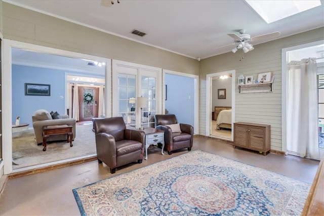 7430 Bourget Dr, Corpus Christi, TX 78413 - sitting room featuring a skylight, ceiling fan, and crown molding