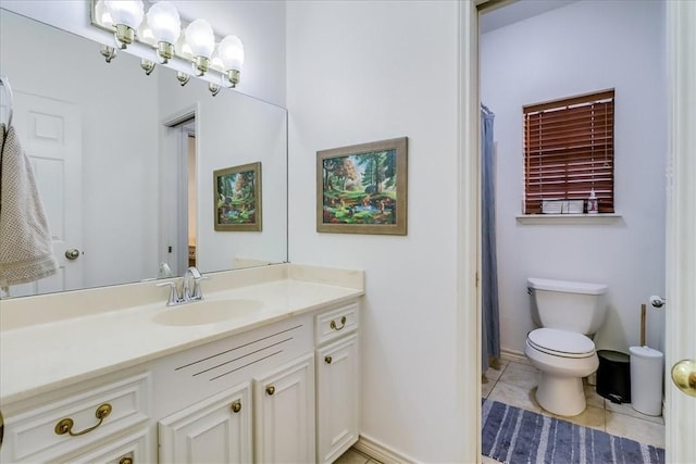 7430 Bourget Dr, Corpus Christi, TX 78413 - full bath featuring vanity, tile patterned floors, and curtained shower