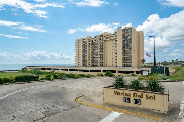 view of building exterior with a water view