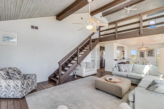 236 Dolphin Ln, Port Aransas, TX 78373 - living room with stairs, ceiling fan, and hardwood / wood-style floors
