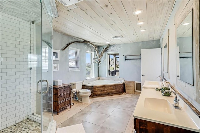 236 Dolphin Ln, Port Aransas, TX 78373 - bathroom with a stall shower, a garden tub, tile patterned flooring, wooden ceiling, and recessed lighting