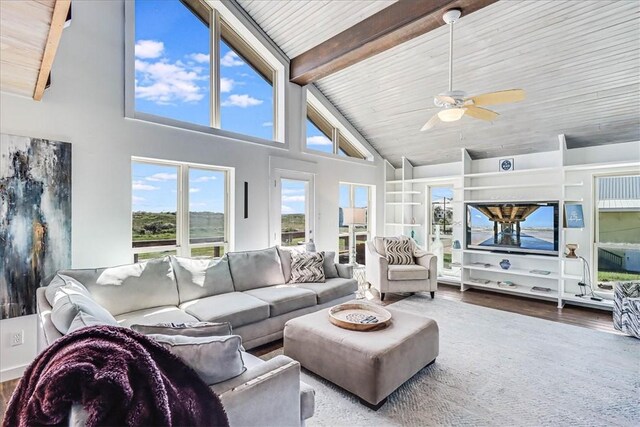 236 Dolphin Ln, Port Aransas, TX 78373 - living room with high vaulted ceiling, wood finished floors, wooden ceiling, ceiling fan, and beamed ceiling