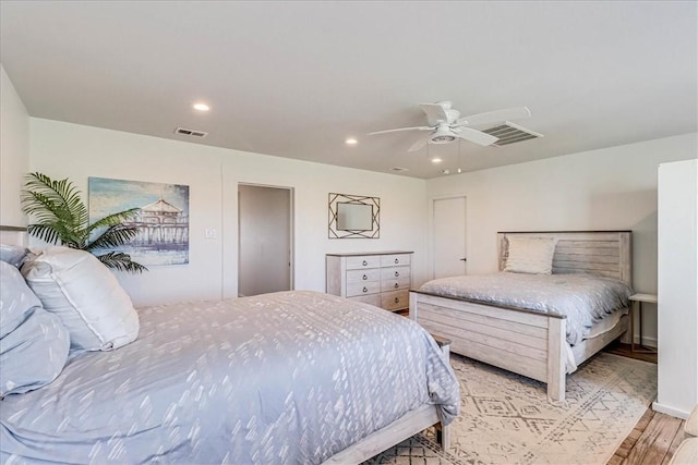 236 Dolphin Ln, Port Aransas, TX 78373 - bedroom featuring light wood-style floors, recessed lighting, and ceiling fan