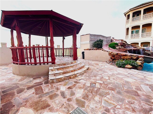 patio terrace at dusk with a gazebo