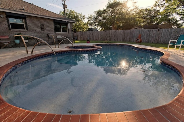 422 Poenisch Dr, Corpus Christi, TX 78412 - view of pool featuring a fenced backyard, a patio area, and a pool with connected hot tub