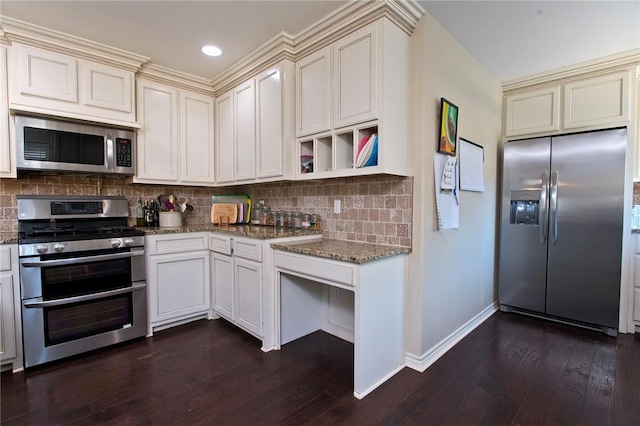 422 Poenisch Dr, Corpus Christi, TX 78412 - kitchen with appliances with stainless steel finishes, stone counters, dark wood-style floors, decorative backsplash, and recessed lighting
