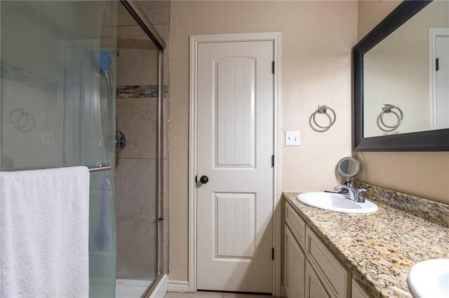 422 Poenisch Dr, Corpus Christi, TX 78412 - bathroom with a shower stall and double vanity