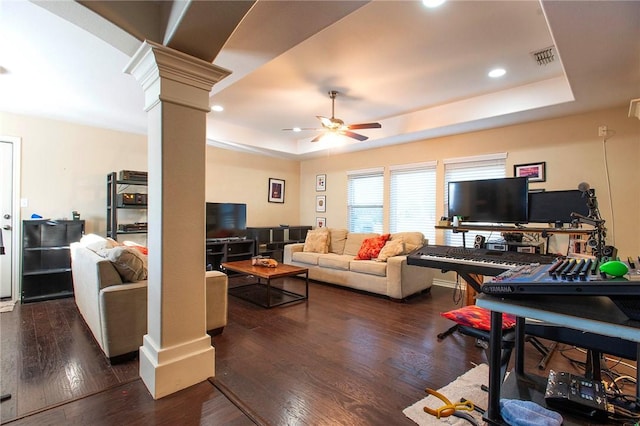422 Poenisch Dr, Corpus Christi, TX 78412 - living room with a raised ceiling, decorative columns, ceiling fan, wood finished floors, and recessed lighting