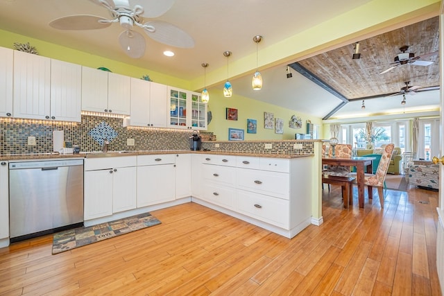 kitchen featuring a peninsula, light wood-style floors, backsplash, and stainless steel dishwasher