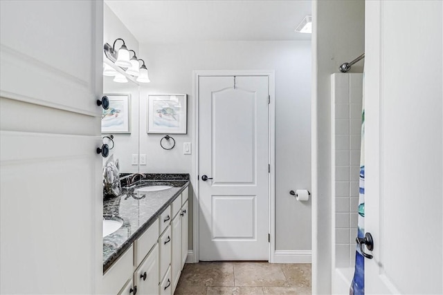 bathroom with vanity and shower / bath combo with shower curtain