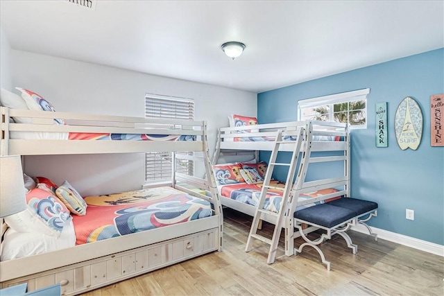 bedroom featuring light wood-type flooring