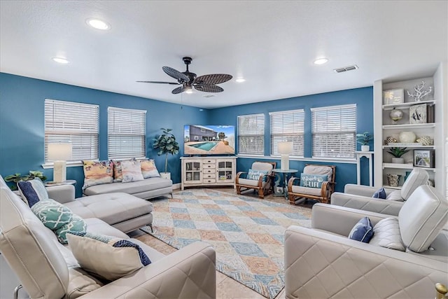 living room featuring ceiling fan