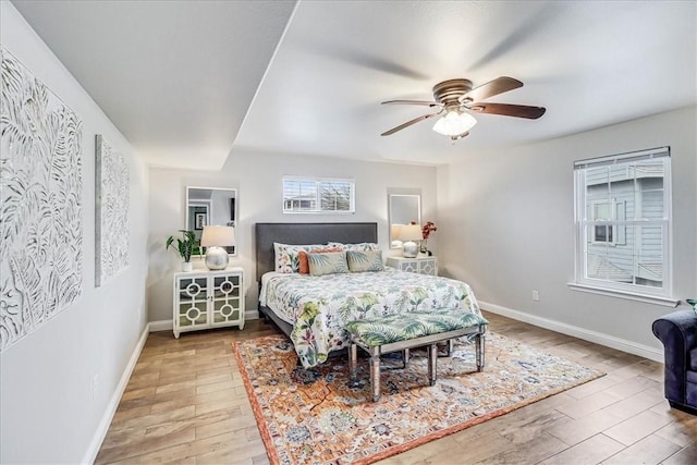 bedroom featuring hardwood / wood-style floors and ceiling fan