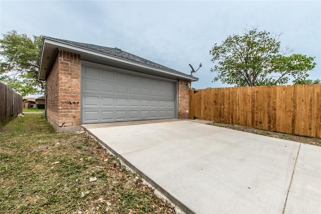 detached garage with fence
