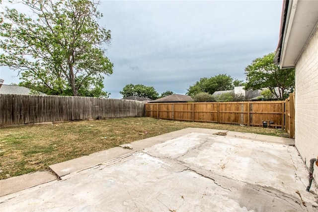 view of patio with a fenced backyard