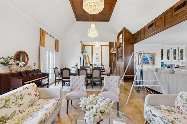 living room featuring visible vents, ornamental molding, light tile patterned floors, a chandelier, and vaulted ceiling