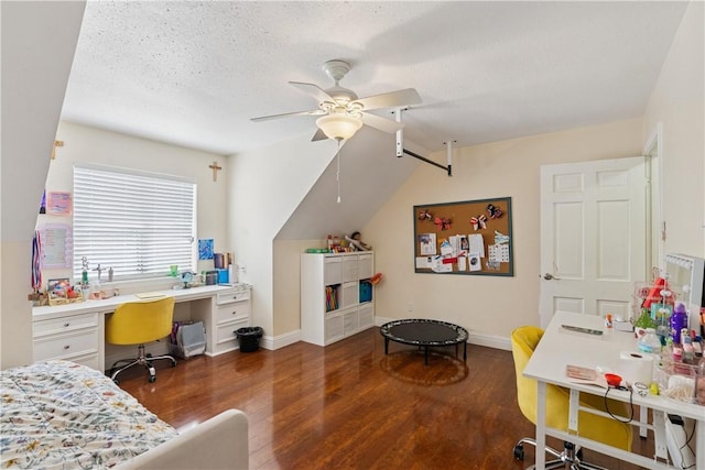 bedroom featuring vaulted ceiling, wood finished floors, baseboards, and ceiling fan