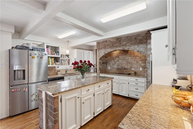 kitchen with beam ceiling, stainless steel appliances, and dark wood-type flooring