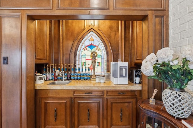 bar featuring a sink and wet bar