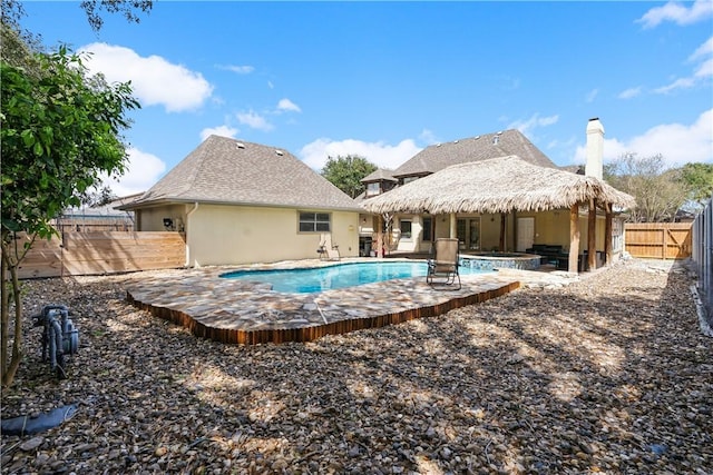 view of pool with a fenced in pool, a patio, and a fenced backyard