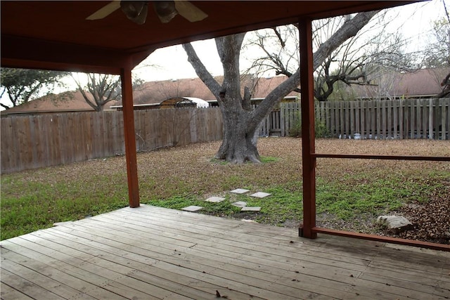 deck featuring a fenced backyard and ceiling fan