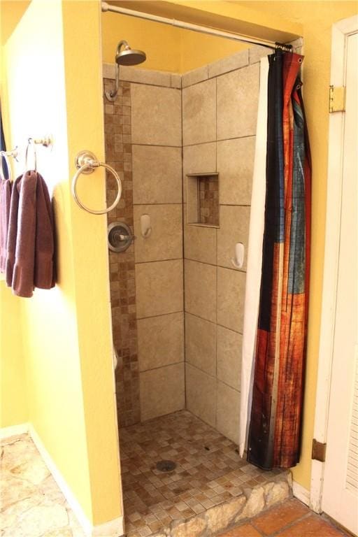 bathroom featuring a stall shower