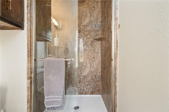 1689 Mooney Ln, Ingleside, TX 78362 - bathroom featuring a shower stall
